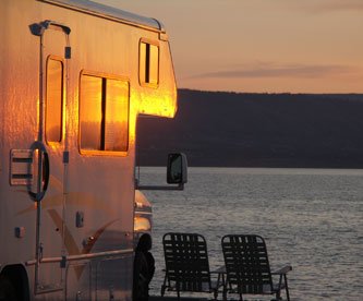 Do I need to reserve my campsite ahead of time for RV road trip in Canada?