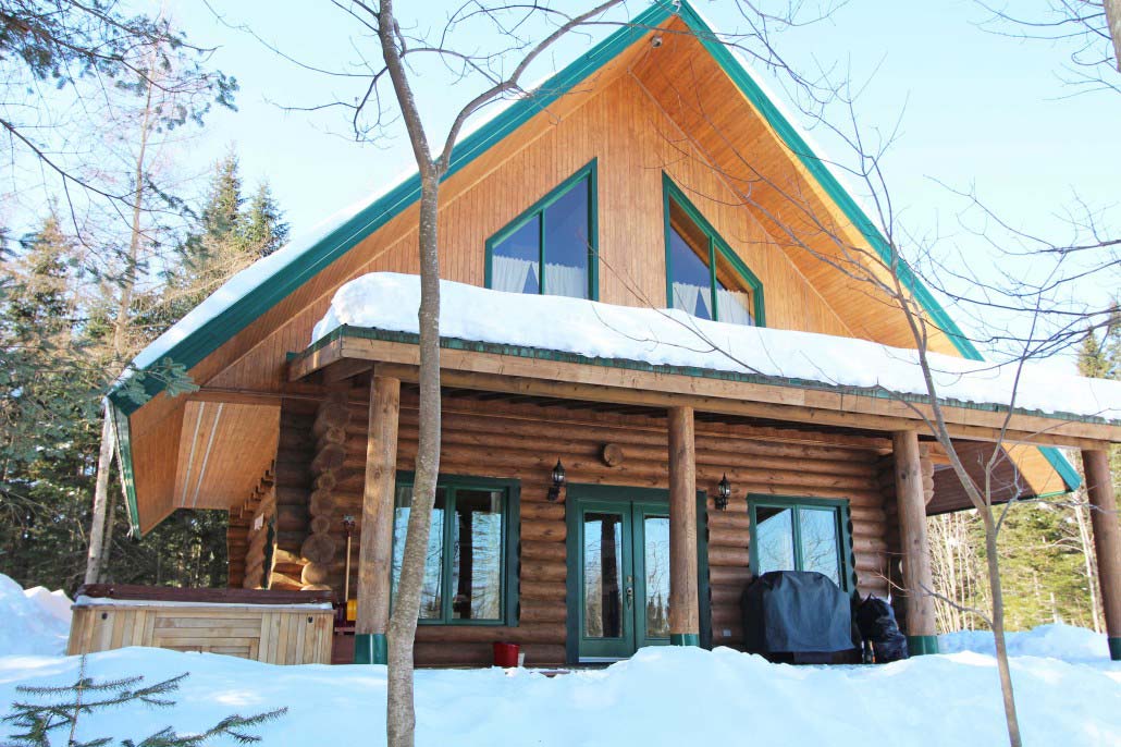 Chalet en bois rond L'Aurore-Boréale