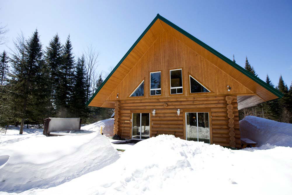 Chalet en bois rond Le Loup-Blanc